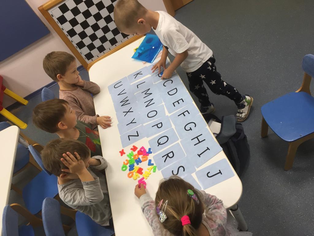 Kindies playing with alphabet